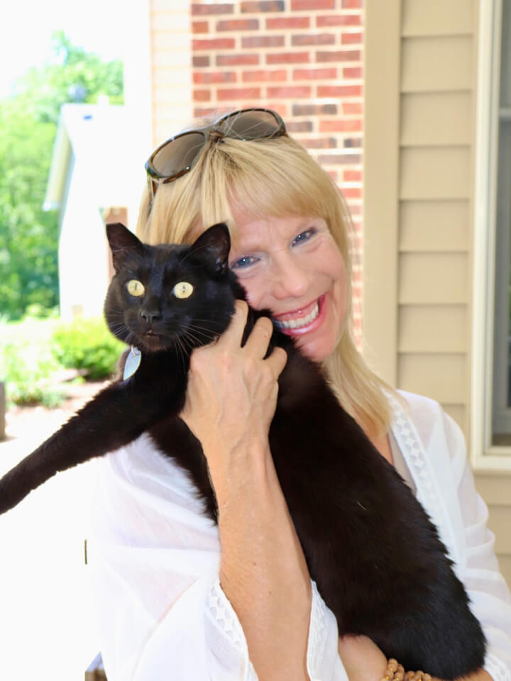 Regan holding her cat